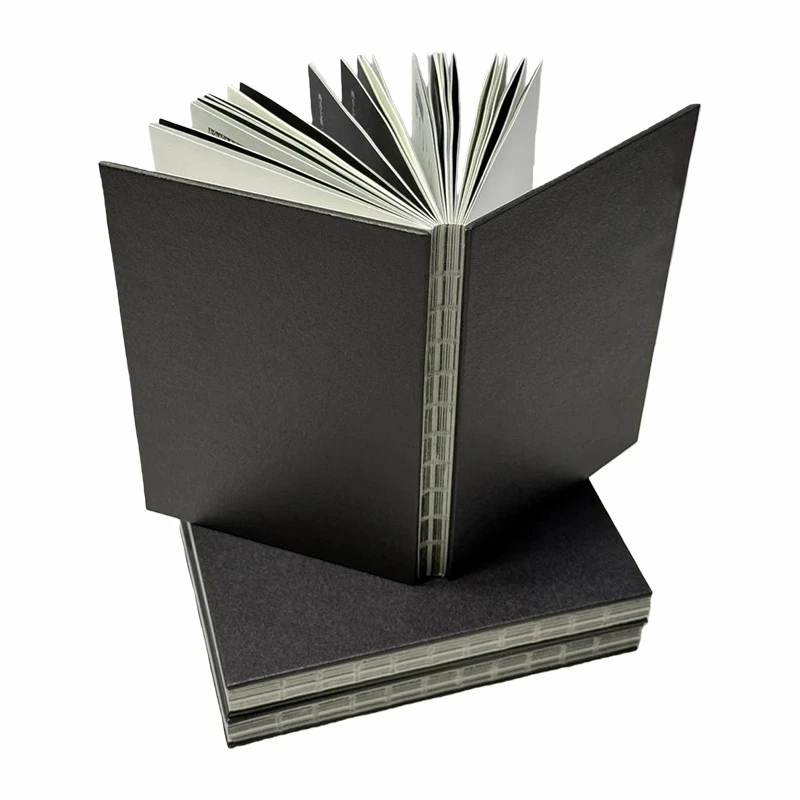 Rilegatura cucita di libri e album fotografici